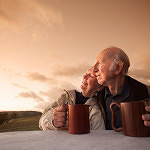 elderly-couple-sunset-coffee